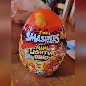 Smashers Mini Light Up Dino Surprise Egg